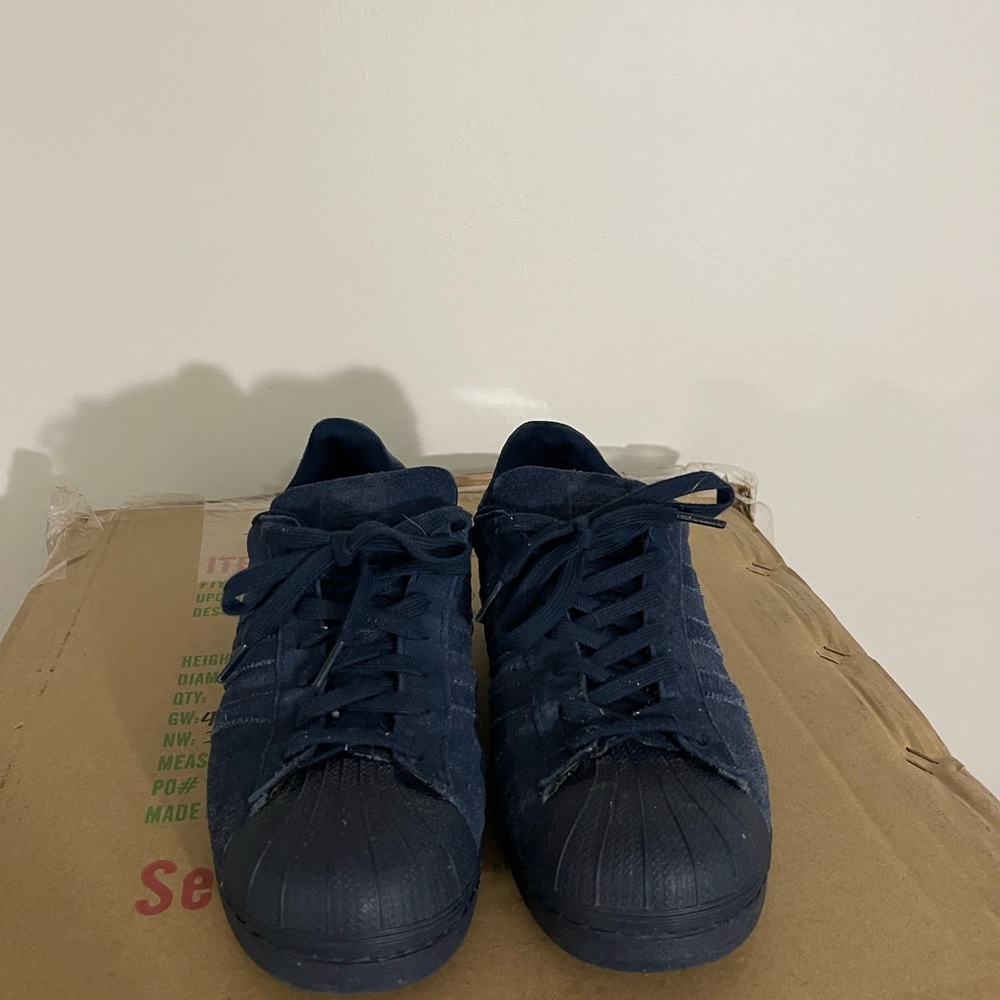 I’m selling some dark blue adidas